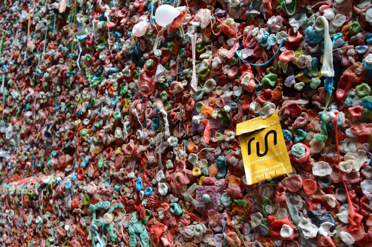 RunGum's tweet image. We made sure to leave our mark in Seattle #GumWall #RunGum #Troll