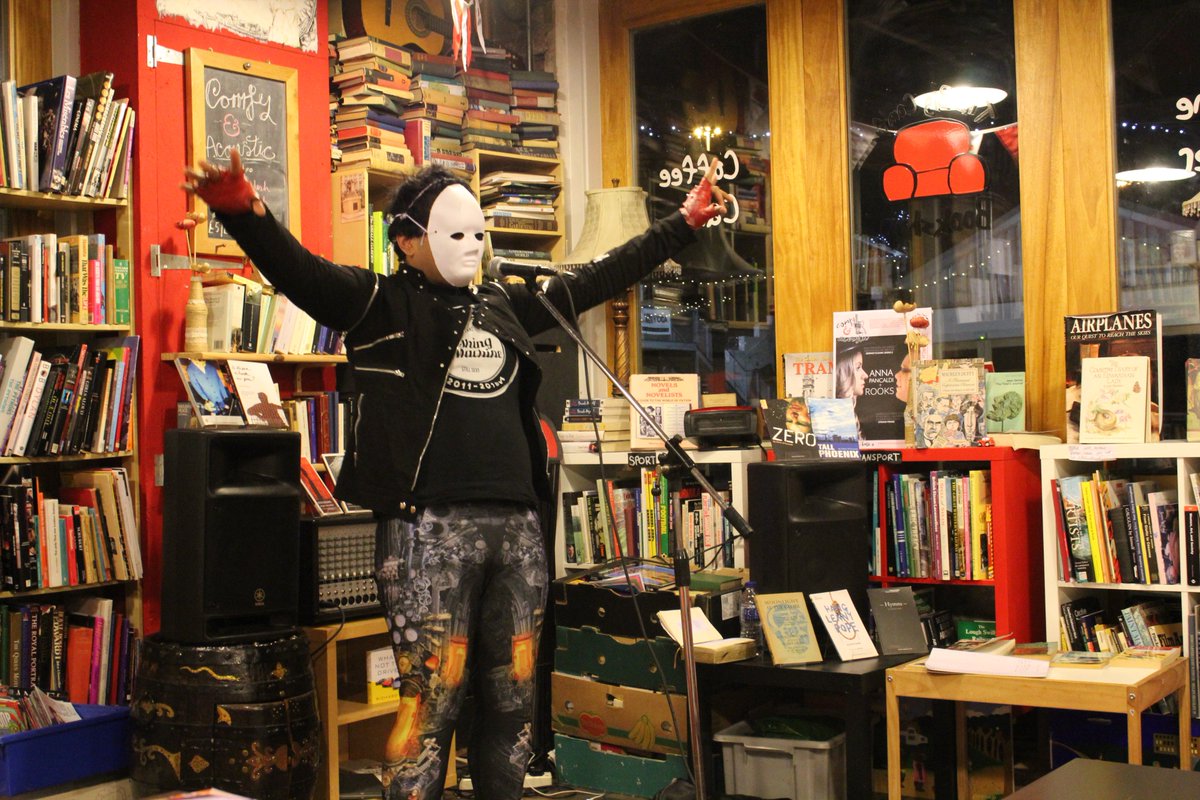 HereComesEvery1's tweet photo. Something different at #FireandDust tonight. Shout-out to @bigcomfybooks and @DrayZera. Another good night of poetry. https://t.co/hRBiI3bPrd