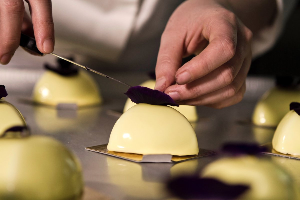The La Mancha is one of kind, w/saffron crème brulee, light honey mousse &amp; sweet blackberry coulis with a delicious shortbread biscuit.