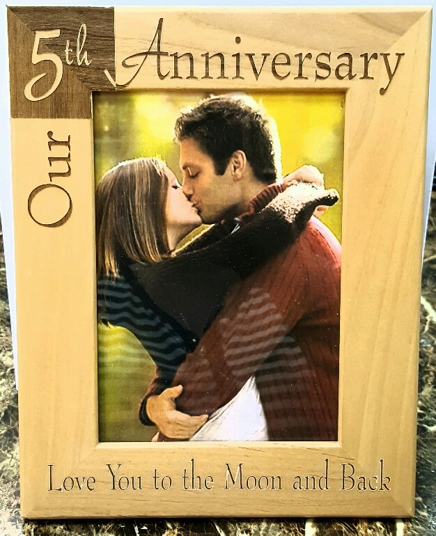 Looking for a special gift for your anniversary? How about a personalized frame? We'll engrave anything you'd like - just bring the photo!