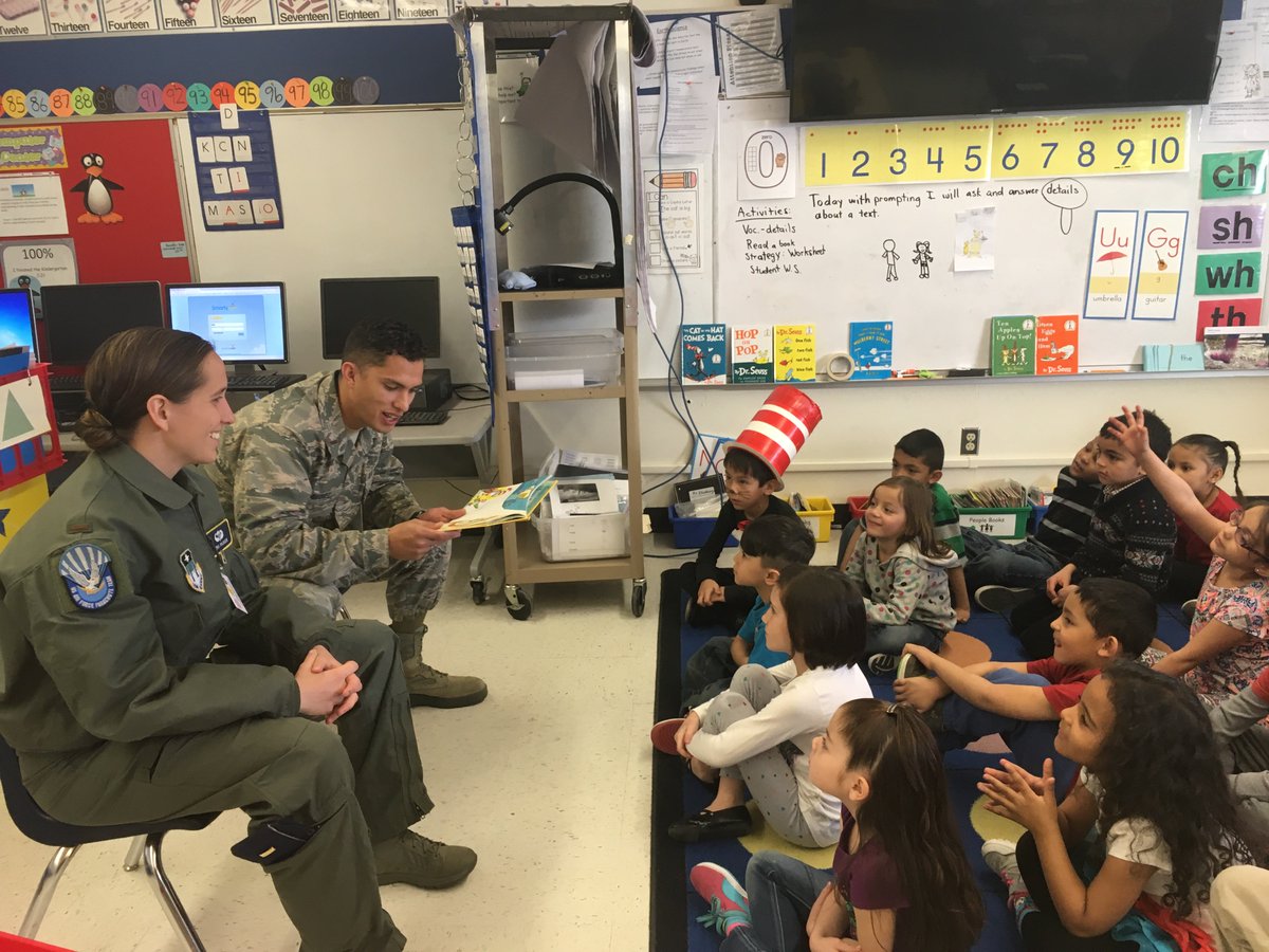 af_academy's tweet photo. Officers from @usafa_admission helped students at Monroe Elementary celebrate Read Across America- Dr. Seuss's birthday today! #YourAcademy https://t.co/VjpMTJgACJ