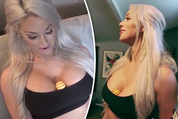 Russian woman can open shirt by flexing boobs.