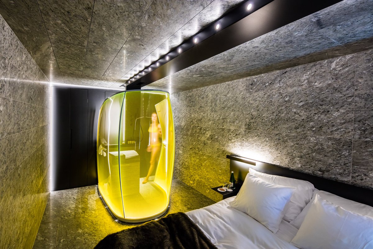 dezeen's tweet photo. Morphosis designs bedrooms for hotel at Zumthor's Vals spa: https://t.co/bGj686v3At https://t.co/CXkD9AHHq8