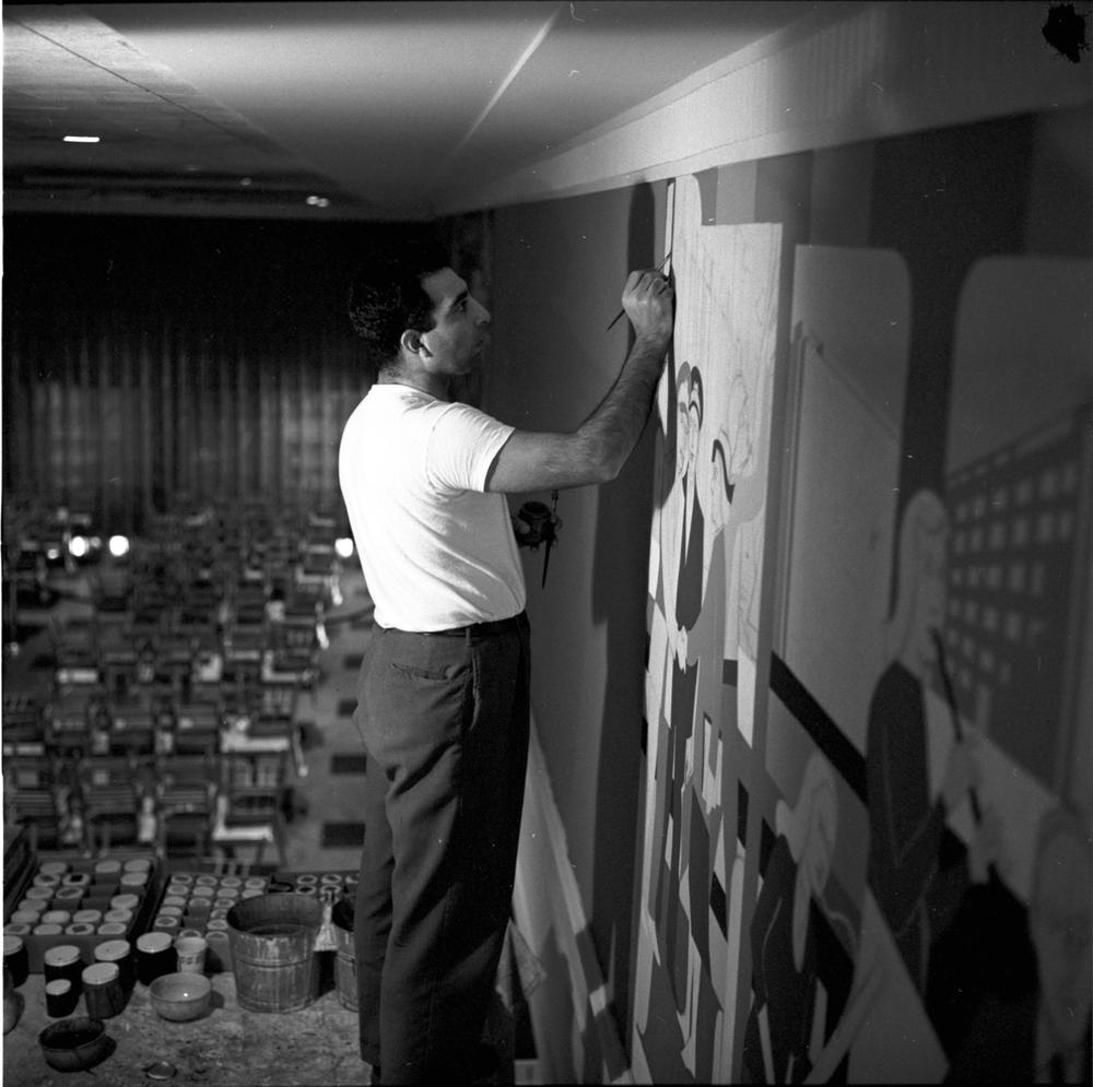 IUBArchives's tweet photo. February 20, 1957: Muralist Garo Antreasian works high above the @WrightQuadIU cafeteria to install its now-iconic murals. https://t.co/keZGlOsS2K