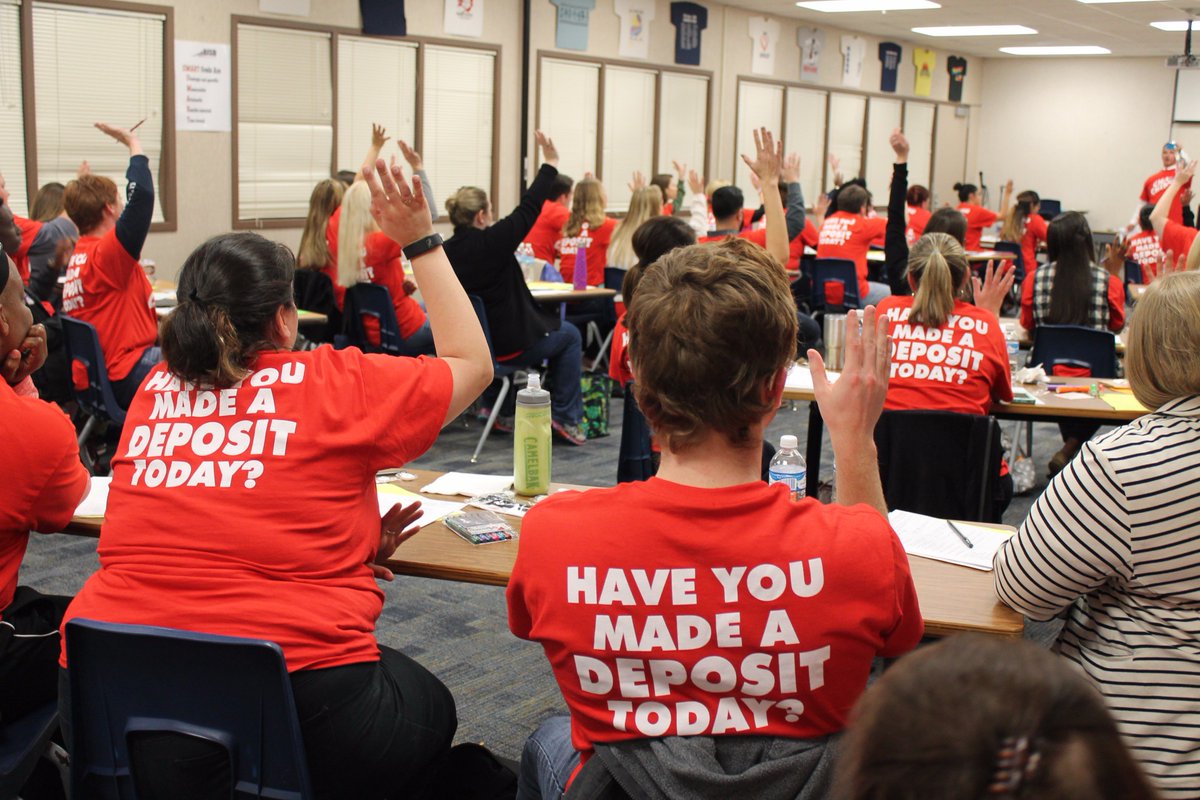 BrazosportISD's tweet photo. BISD teachers wearing Cha-Ching shirts as they discuss making deposits with their students! #BISDpride @mtmcleod66 https://t.co/tY3rEQET3U