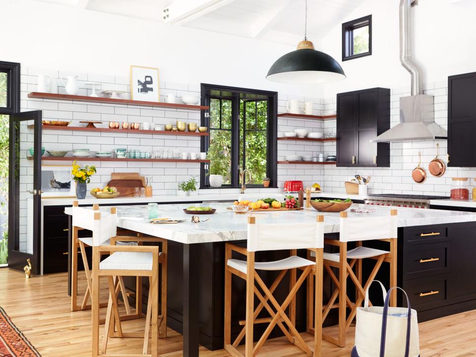 This kitchen proves pairing black with white is a classic for a reason! >> hgtv.com/design/decorat…