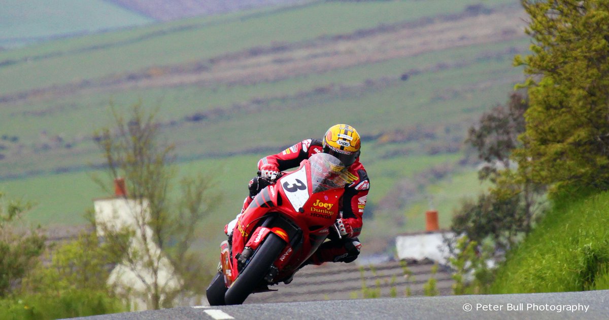 John McGuinness <a href="/jm130tt/">John McGuinness MBE</a> riding the Joey Dunlop Tribute Bike at TT 2013 fantastic pic by Peter Bull.
