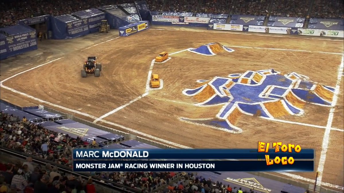 MonsterJam's tweet photo. Marc McDonald in El Toro Loco wins the racing championship at #MJHouston and celebrates with his crew chief. https://t.co/g3NX0fS1fM