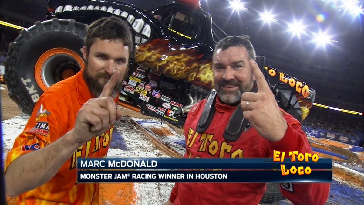MonsterJam's tweet photo. Marc McDonald in El Toro Loco wins the racing championship at #MJHouston and celebrates with his crew chief. https://t.co/g3NX0fS1fM
