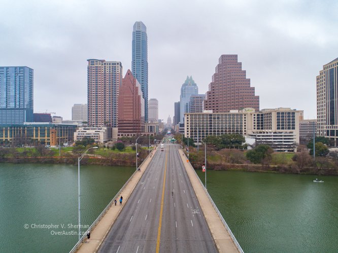 cvsherman's tweet photo. Good night, Austin. #strangesight Congress Ave Bridge deserted after @austinmarathon'er headed south #runaustin17 #austinmarathon https://t.co/H5vXucaePJ