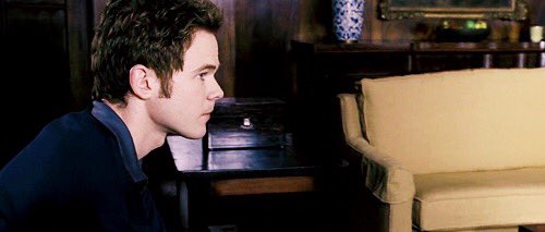 Jerich sits at the Titan Tower, watching some of the news. He blinks a bit and turns away from the TV, as the news-