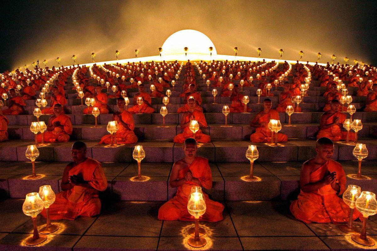 This is what a Buddhist monk lantern lighting ceremony looks like.