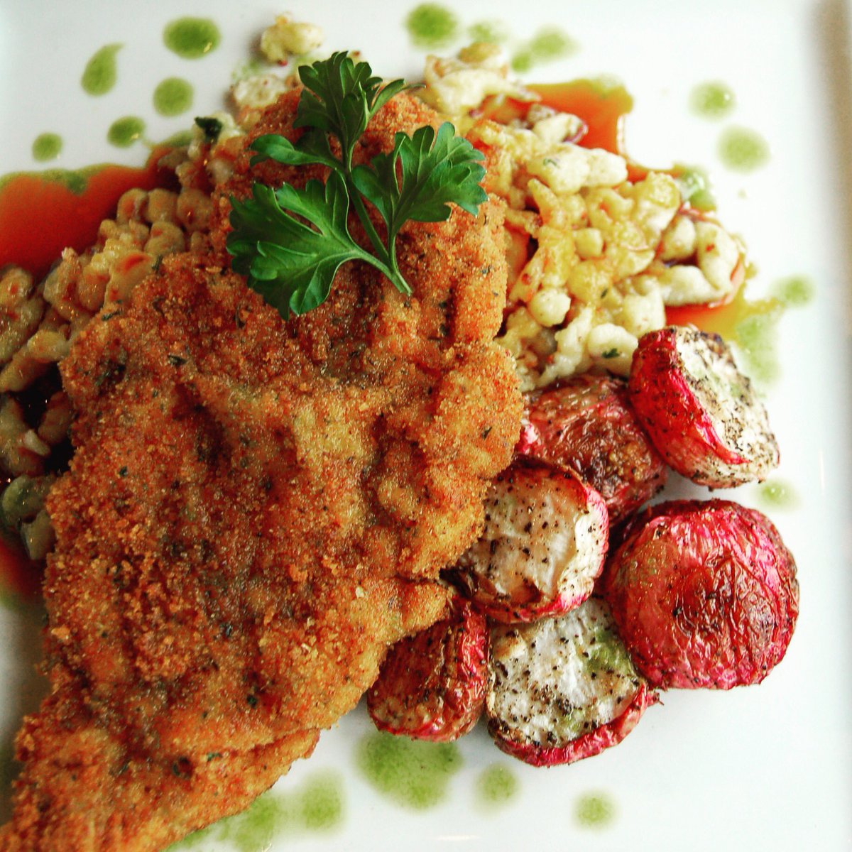 This week's feature main is a tender pork schnitzel served with house-made mustard spatzle, horseradish jus, roasted radish and chive oil. 😍
