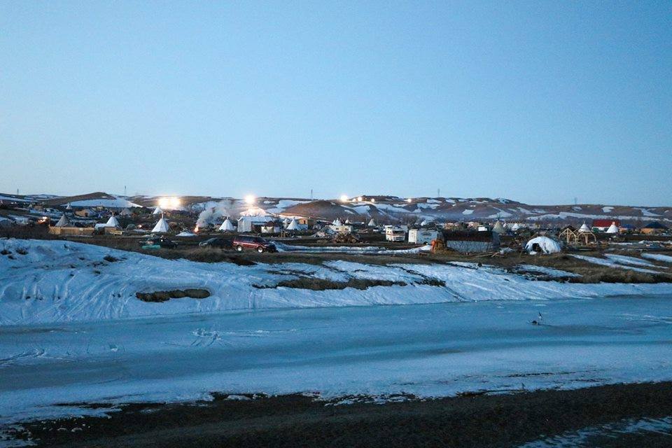 waternotoil's tweet photo. Tomorrow, law enforcement comes to remove us. Feb. 22, 2:00 PM. Please pray for us... #noDAPL #WaterProtectors [Photo by MKUltraRE] https://t.co/eWU9IAJhXS