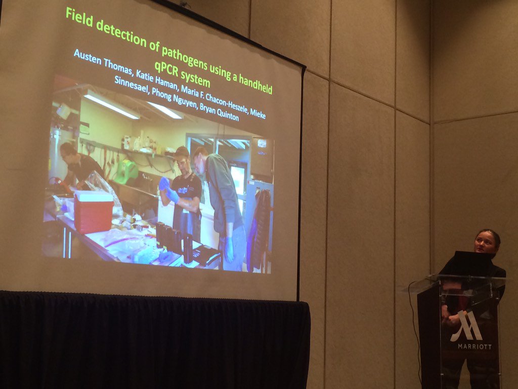 Perelmax's tweet photo. Katie Haman and Austen Thomas presenting latest study using @BiomemeInc handheld PCR for aquaculture @mfchacon https://t.co/otAHLjcMpc