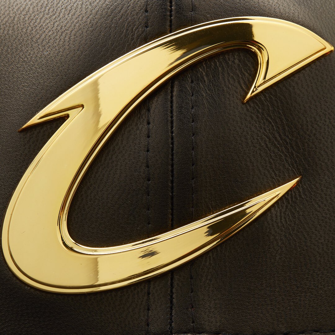 New Cavs logos emphasize gold and wine colors, drops navy