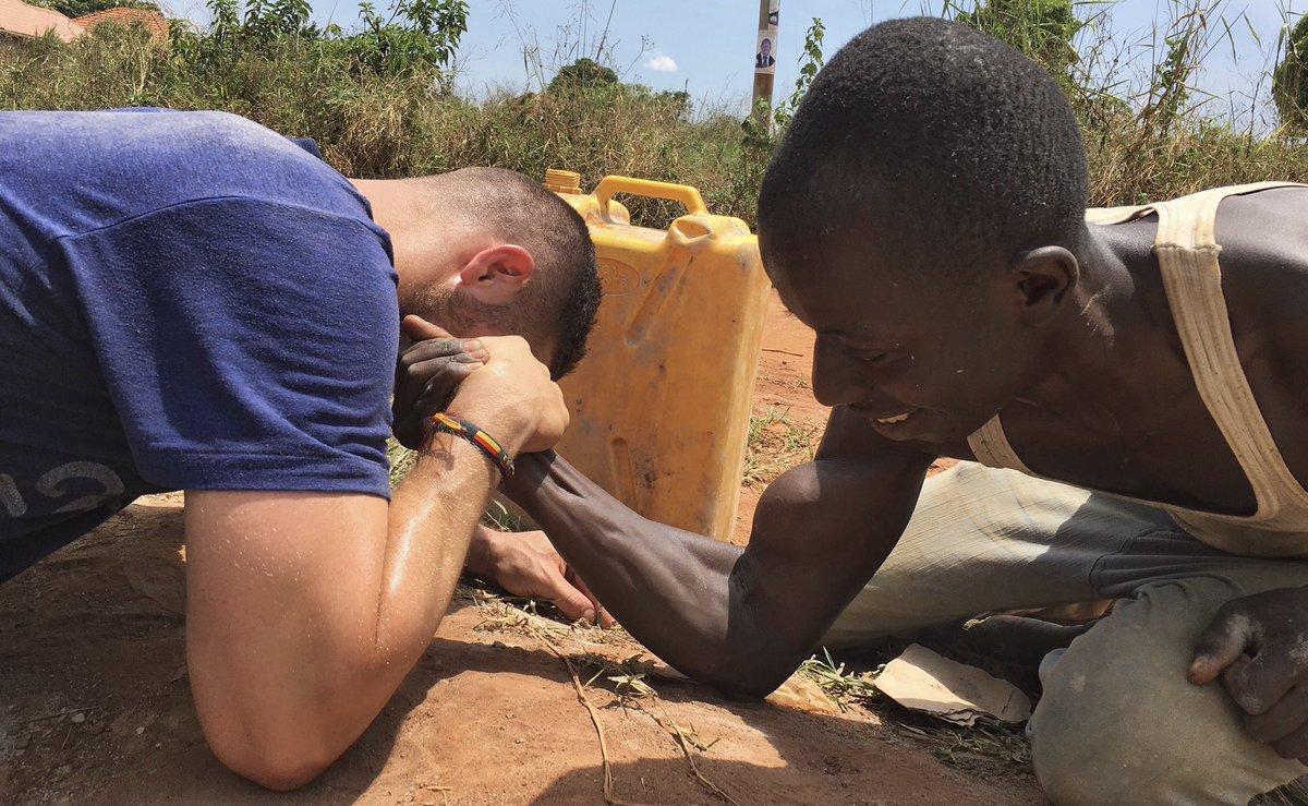 Sometimes while doing construction work, you settle a debate with a friendly arm wrestling match. Sign up today for our June Uganda trip!