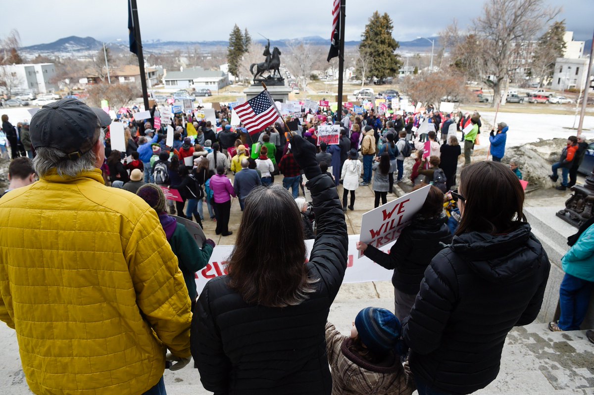 thom_g_bridge's tweet photo. PHOTOS: Hundreds of protesters gather to #BringtheTownHall to @SteveDaines who canceled his address: https://t.co/2CbYAnRhEY  #mtnews #mtpol https://t.co/CuJblpf6wk