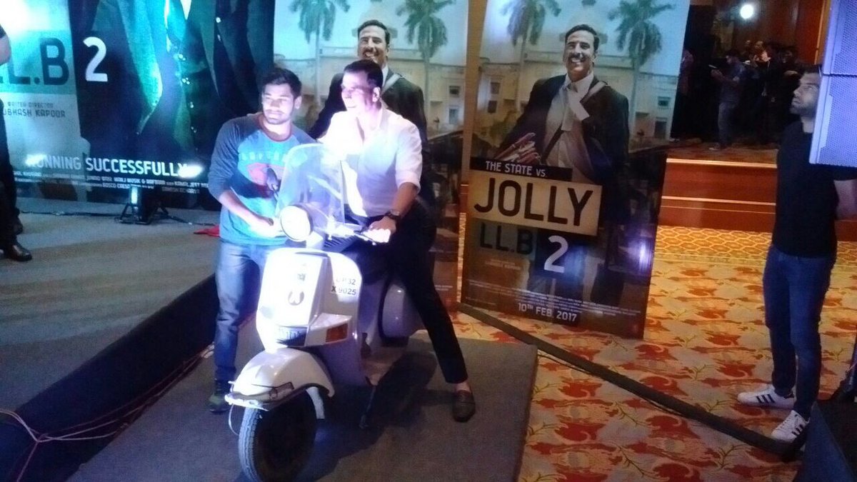 Akkistaan's tweet photo. Pics  @akshaykumar sir with the winner of #DirectJollyTak contest, giving Jolly's scooter! #SuperHitJollyLLB2

JOLLY HITS CENTURY #JollyLLB2 https://t.co/FJFdP8l1tC