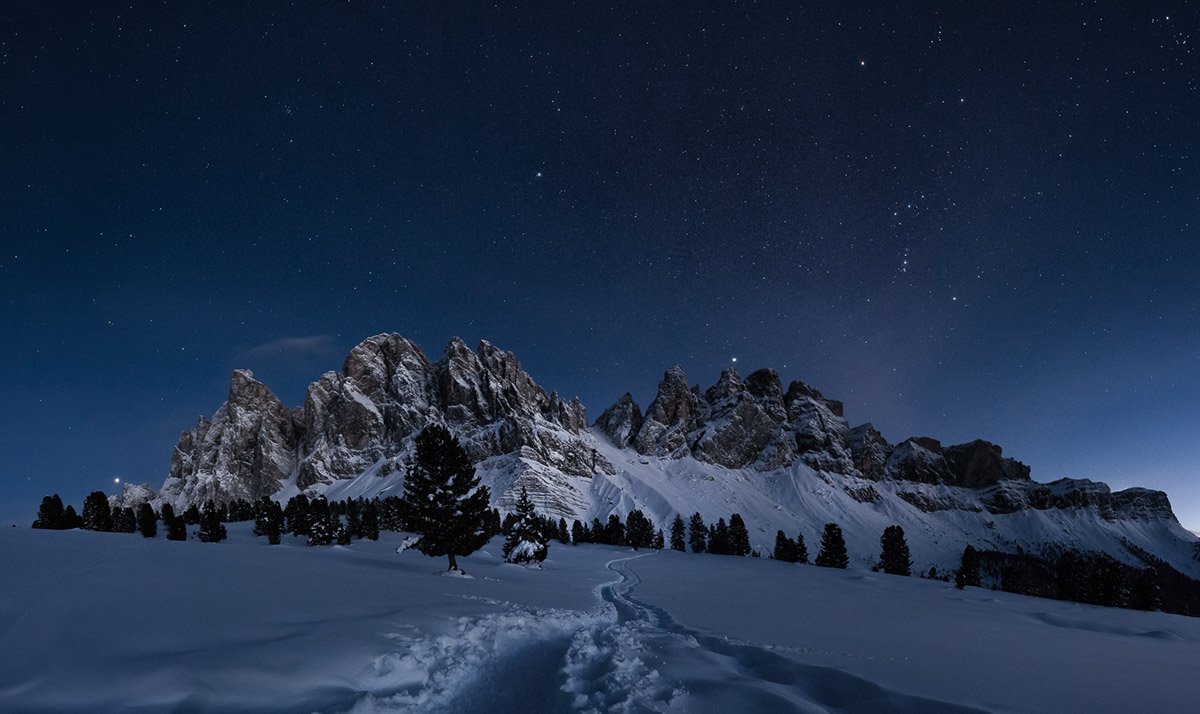 Adobe's tweet photo. Chilling ❄️ snapshots from Chris König’s solitary wanderings through the Dolomites: https://t.co/YNGAqZE4wI https://t.co/1NgNH3Jynf