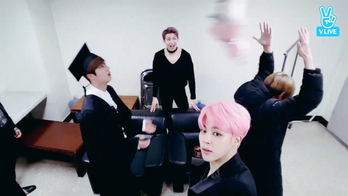 pudgybee's tweet image. BTS throwing things over their heads &amp;amp; someone catching them like it's a bouquet throw at a wedding &amp;amp; I just 🙈🎓💐 #JINGraduationDay #TooExtra