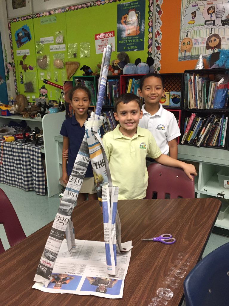 2nd grade challenge. Two sheets of newspapers and 12 inches of tape. Must withstand wind.  I gave no tips or tricks. #browardstem