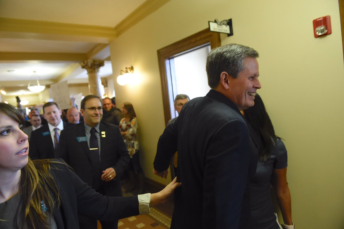 <a href="/SteveDaines/">Steve Daines</a> flees a press conf. as chants of "do your job" echo in the Rotunda. #mtnews #mtpol