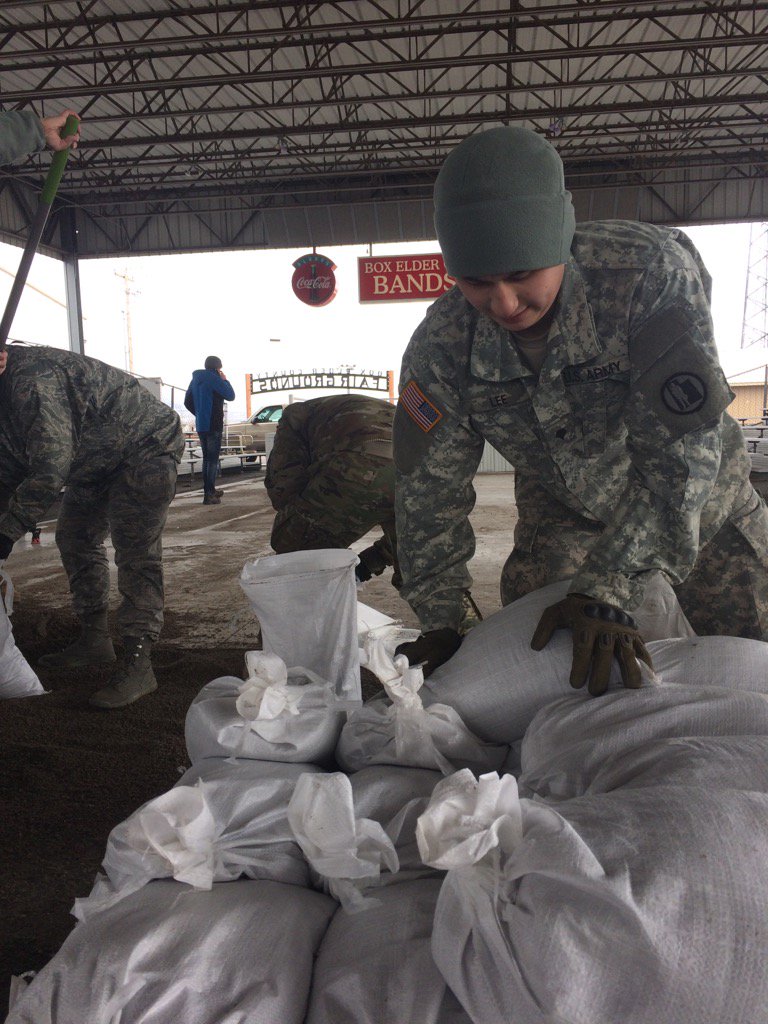 UTNationalGuard's tweet photo. #UTGuard filling sand bags at Box Elder County Fair Grounds #Operationfloodrelief17 https://t.co/TTqiuytDFO