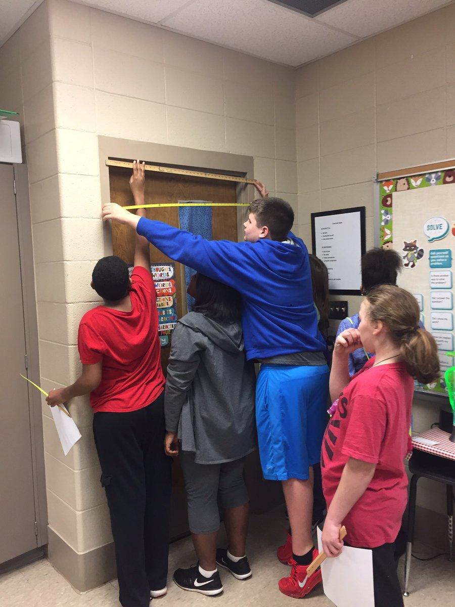 MrsSReaves's tweet photo. How many students does it take to measure a doorway? #WELOVEMATH #AISProud https://t.co/kDwhDsXgfV