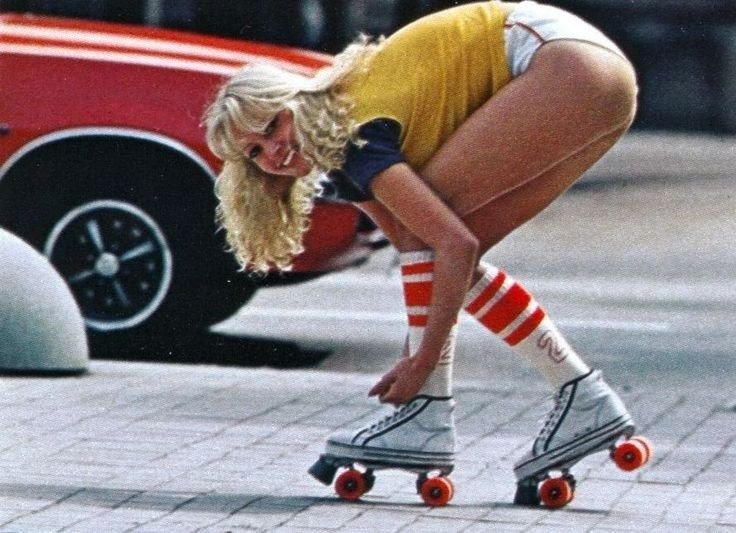 Pretty girl in hot pants and roller skates, 1970's