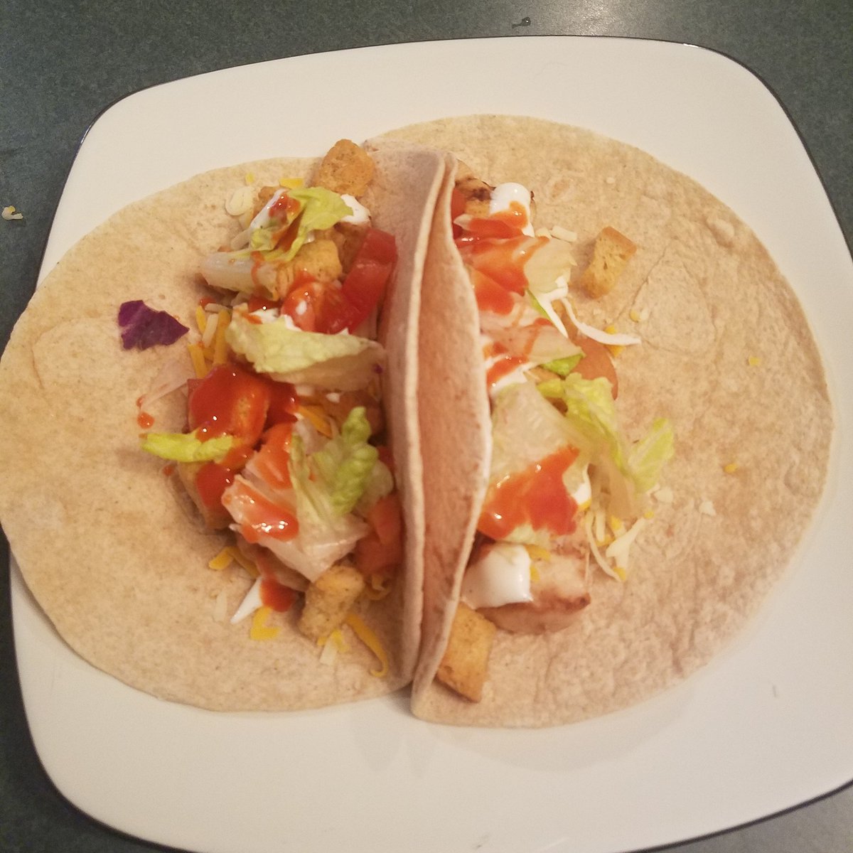 D_CFitness's tweet photo. Loving these buffalo chicken tacos: *Whole wheat tortilla *chicken *lettuce *hot sauce *ranch *tomatoes *Whole grain croutons #cleaneating https://t.co/qjTYv7ckKx