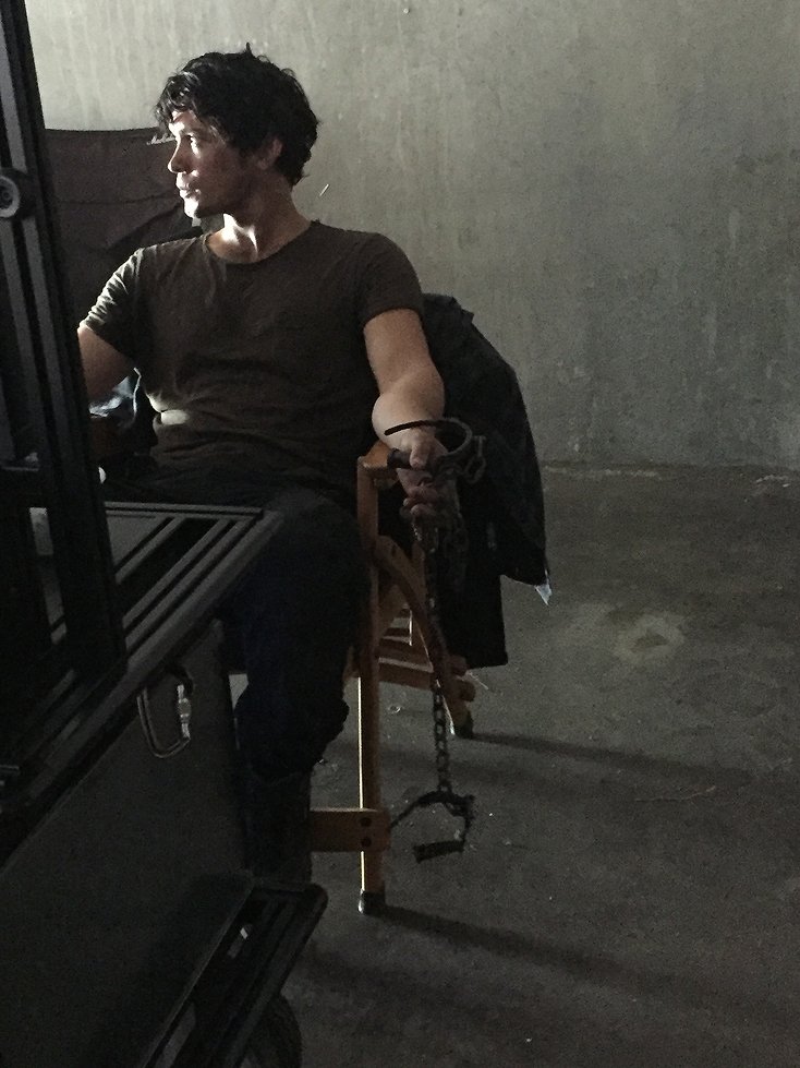 The100writers's tweet photo. .@WildpipM sits behind the DP's monitors in between takes #The100 https://t.co/8DH7QYAwVo