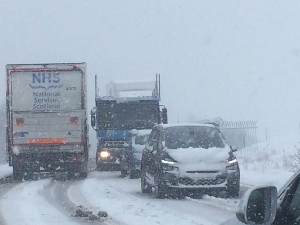 Some cars braving terrible roads to come south but lorries stuck going north just outside Shotts. #stormdoris
