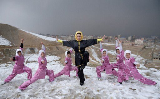 RaziaHussainy's tweet photo. On a #kabul hilltop the first #wushu trainer, training 20 young Afghan girls,I am proud of #simaAzimi. https://t.co/Q9nUKfzcc0