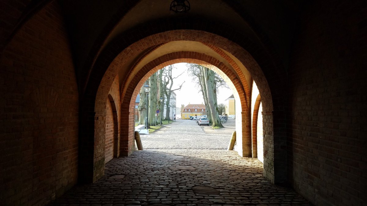 MPH_Soroe's tweet photo. The Akademi gatehouse and Sorø town square. Group before our trip to Odense. #MPHtoDenmark https://t.co/D4tGyDsbKt