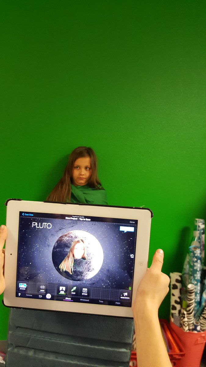 AmandaLanicek's tweet photo. Lily wanted her face to be part of a planet so she improvised with our old green screen (sheet)! We love our new green screen wall! #DLDay https://t.co/bxgsevukiQ