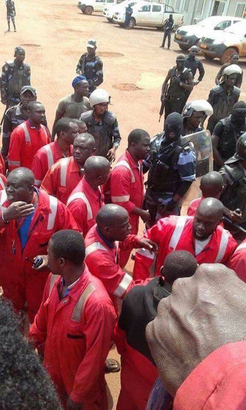 brett_l_carter's tweet photo. #Gabon: Images from labor union strike at Maurel Prom this morning show Bongo military encircling employees. As many soldiers as workers? https://t.co/CxsPqRX2E8