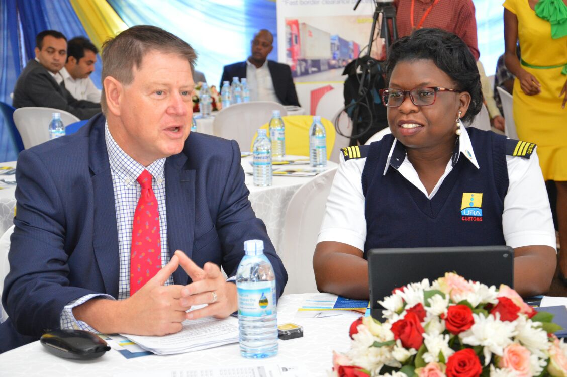 URAuganda's tweet image. CEO @TradeMarkEastA ; @FrankMatsaert sharing a word with @URA_CG at the DPC/RECTS launch. TMEA is a regional devt partner #TradeFacilitation