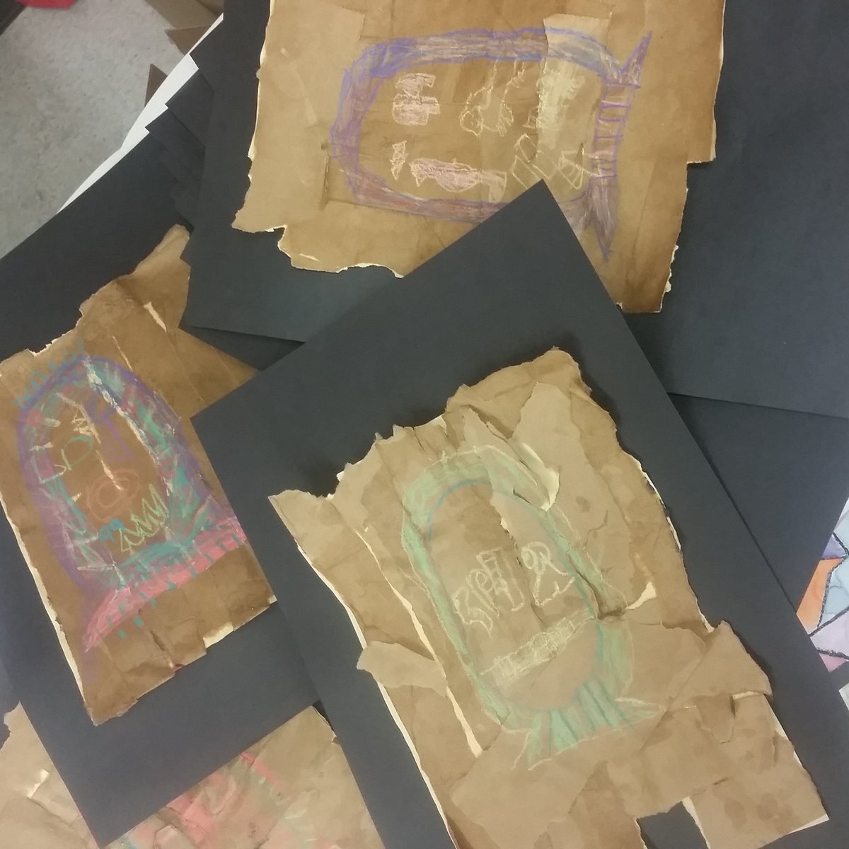 mrslynnsartroom's tweet image. These #secondgradeart #ancientegypt cartouches are so exuberant!  They loved making &quot;papyrus&quot; out of old brown bags!
