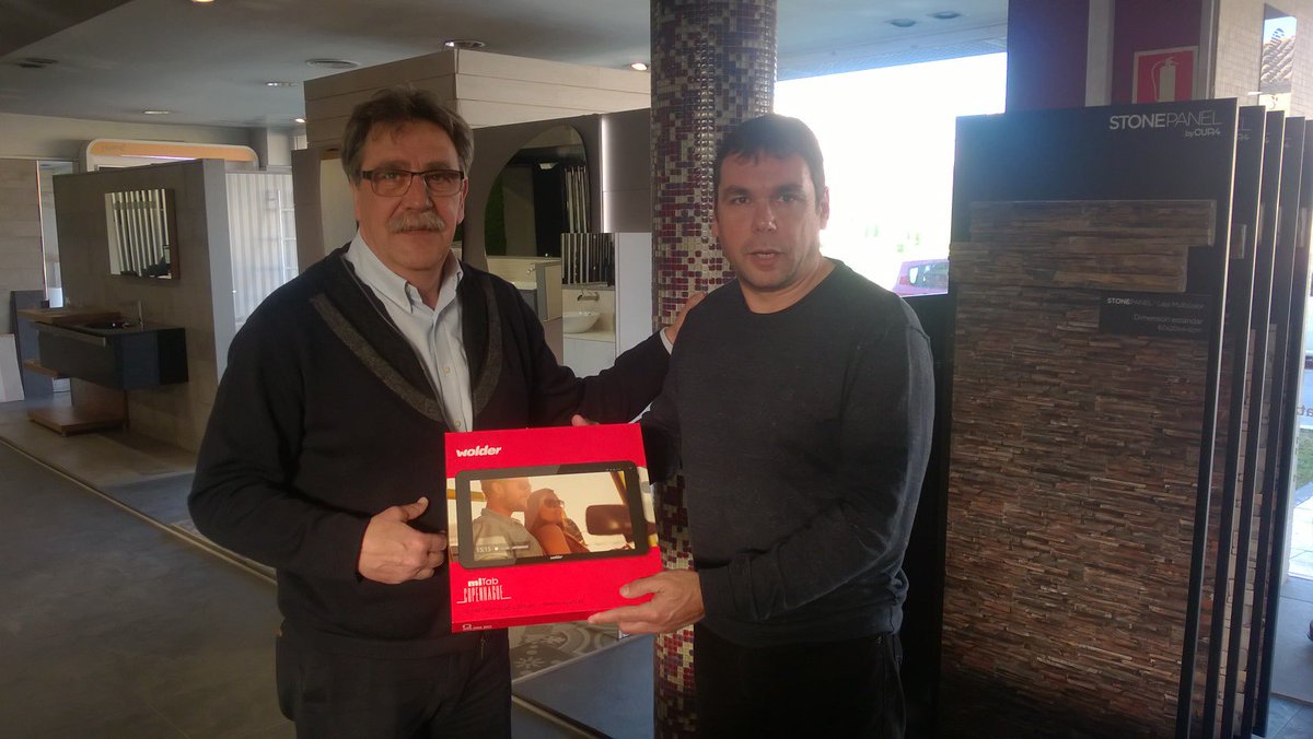 AdequaEs's tweet photo. Rafael Carreras, delegado @adequaWS, entrega dos tablets a Clemente, de #Isolana, y a Eugeni, de #Oliveras, dentro de la campaña #Matdeco https://t.co/psOl1e03ic