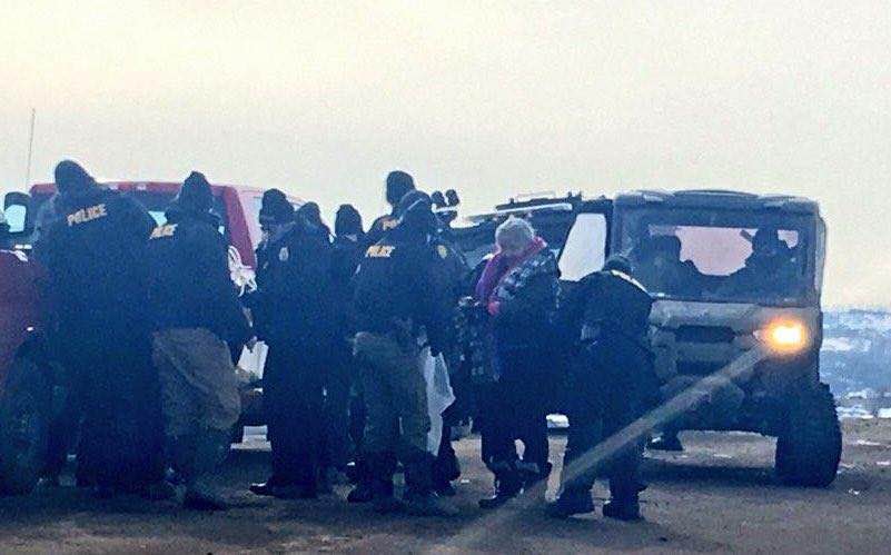 AmericanIndian8's tweet photo. What Kind Of Country Do We Live In When A 80 y.o. Lakotah Unci Is Forcibly Removed Off Her Own Land In The Name Of Oil?
#NoDAPL @POTUS https://t.co/BLOUizSBV5