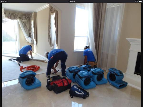 Getting setup; drying ground floor - storm waters