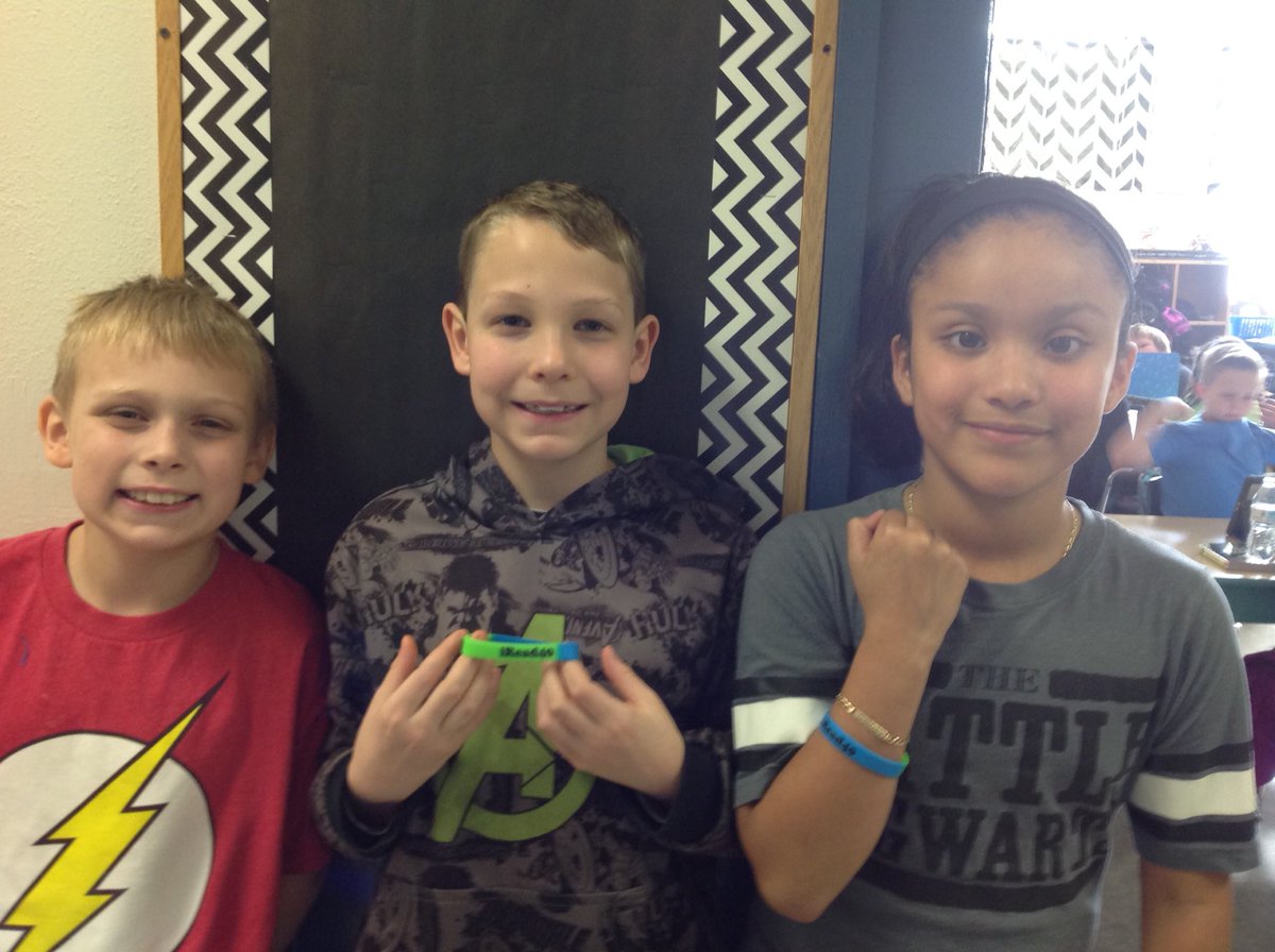 BESEfird's tweet photo. Very proud of these students for earning their iRead40 bracelet! #rssreads #achieve3000 https://t.co/RpQoNamIkL