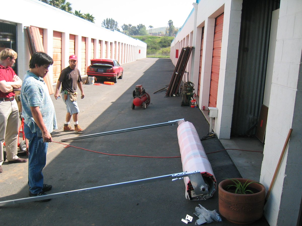 MiniStorage_SD's tweet image. #FlashbackFriday to 2004! We replaced our storage doors will roll up doors!