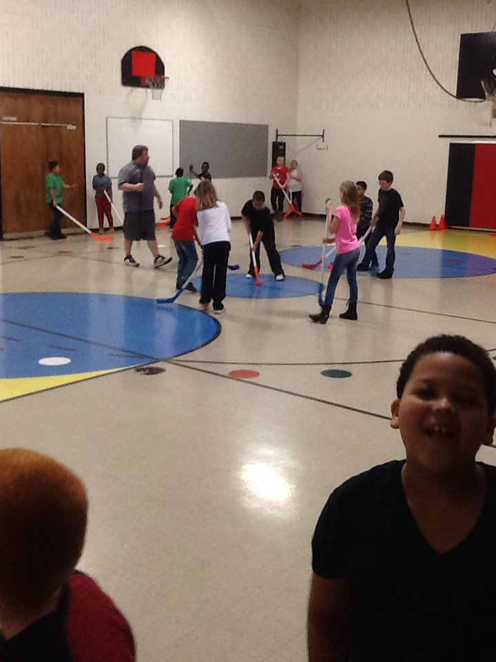 3rd graders practicing their hockey skills.
