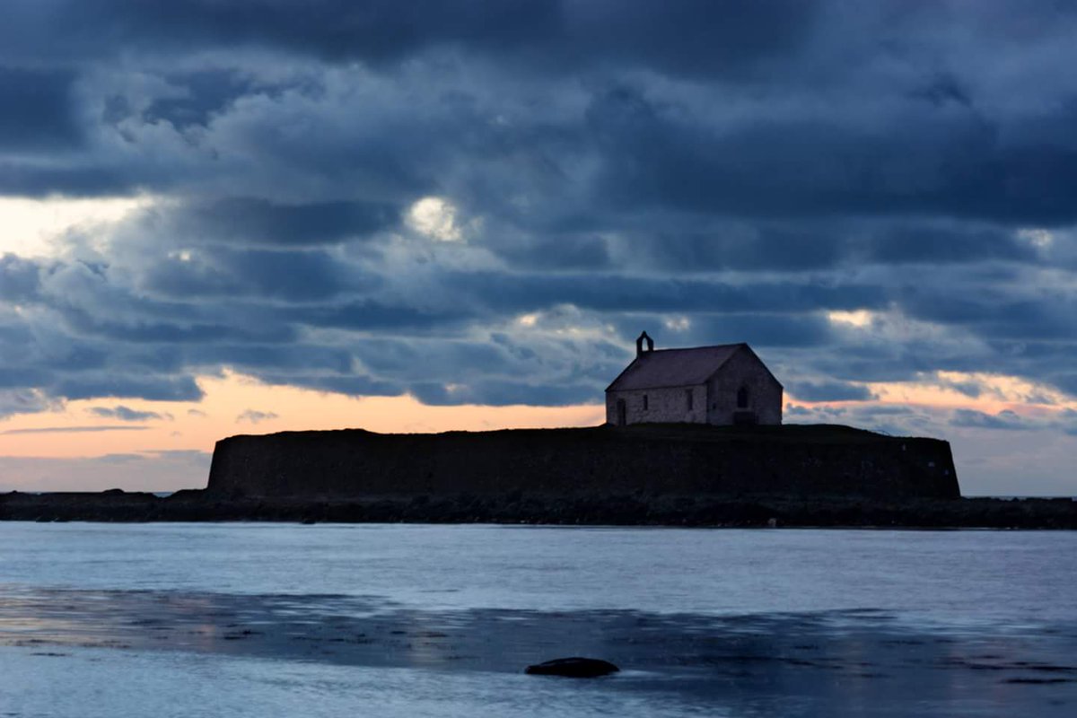 ItsYourWales's tweet photo. Gareth with wonderful #welshtranquility at St Cwyfan Anglesey in a #BeautifulWales courtesy @jgosaug13 https://t.co/nQTo4iFVDo