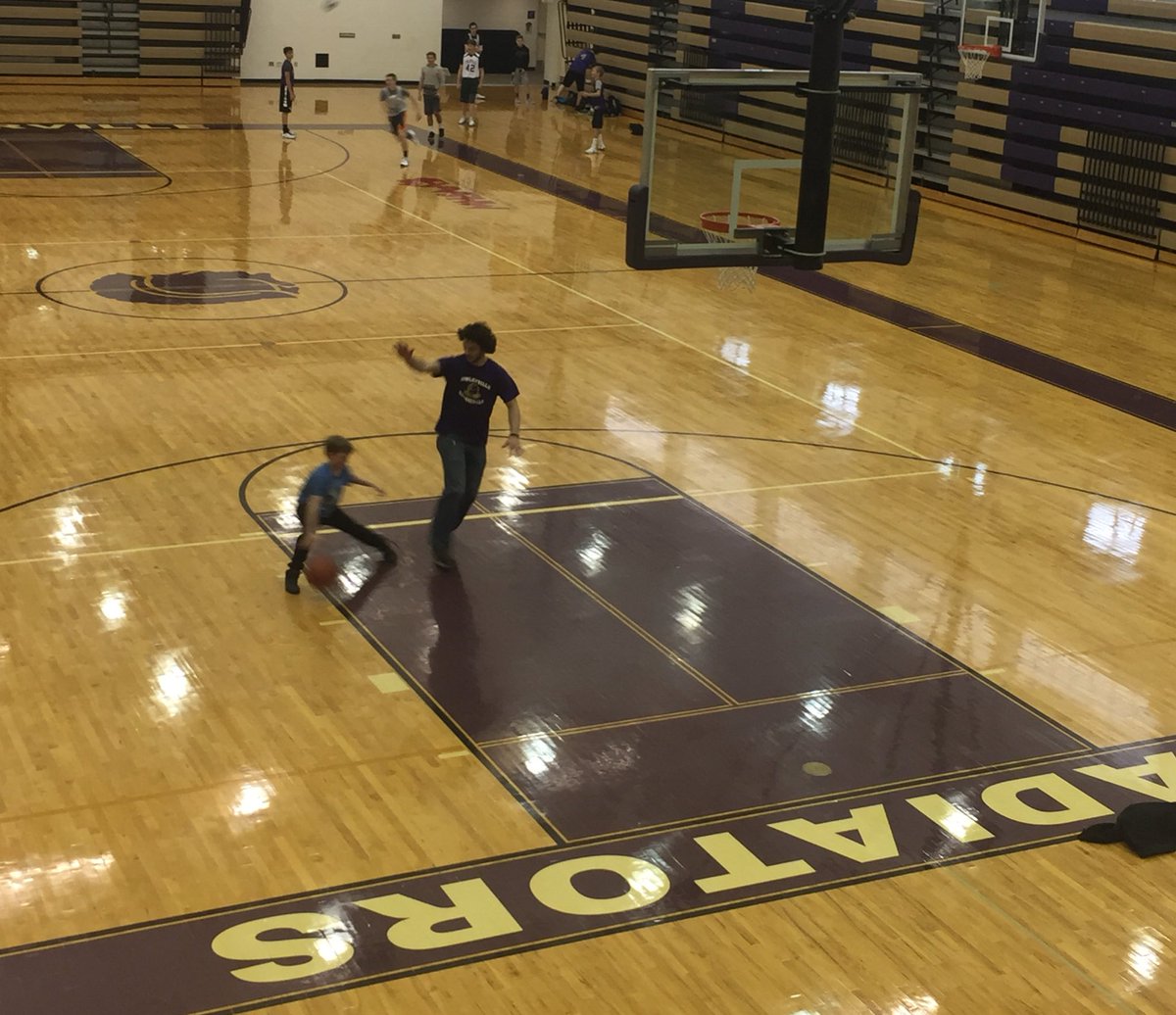 Glads_Athletics's tweet photo. Great moment today! #CurrentGladiator helping our #FutureGladiator get better and create a love for the game! #RoleModels #BleedPurple https://t.co/xPnSRy3oFO