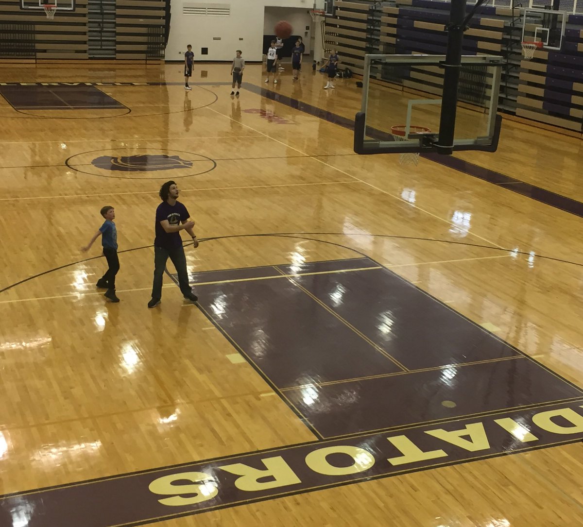 Glads_Athletics's tweet photo. Great moment today! #CurrentGladiator helping our #FutureGladiator get better and create a love for the game! #RoleModels #BleedPurple https://t.co/xPnSRy3oFO