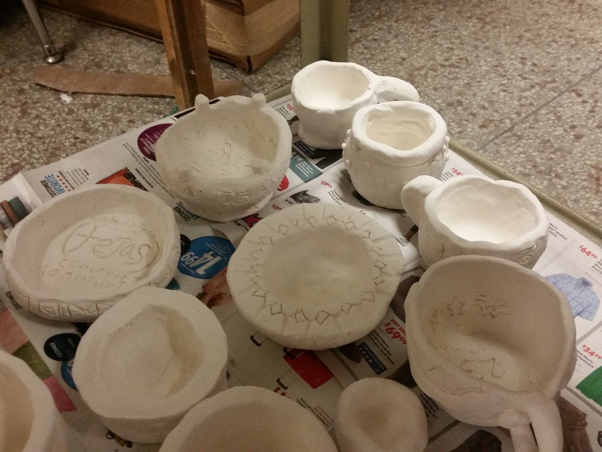 Le_arted's tweet photo. Yay! Our first clay fire! #noexplosions #middleschoolart #clay #handbuilding #bonfacnest https://t.co/fys9qP03HW