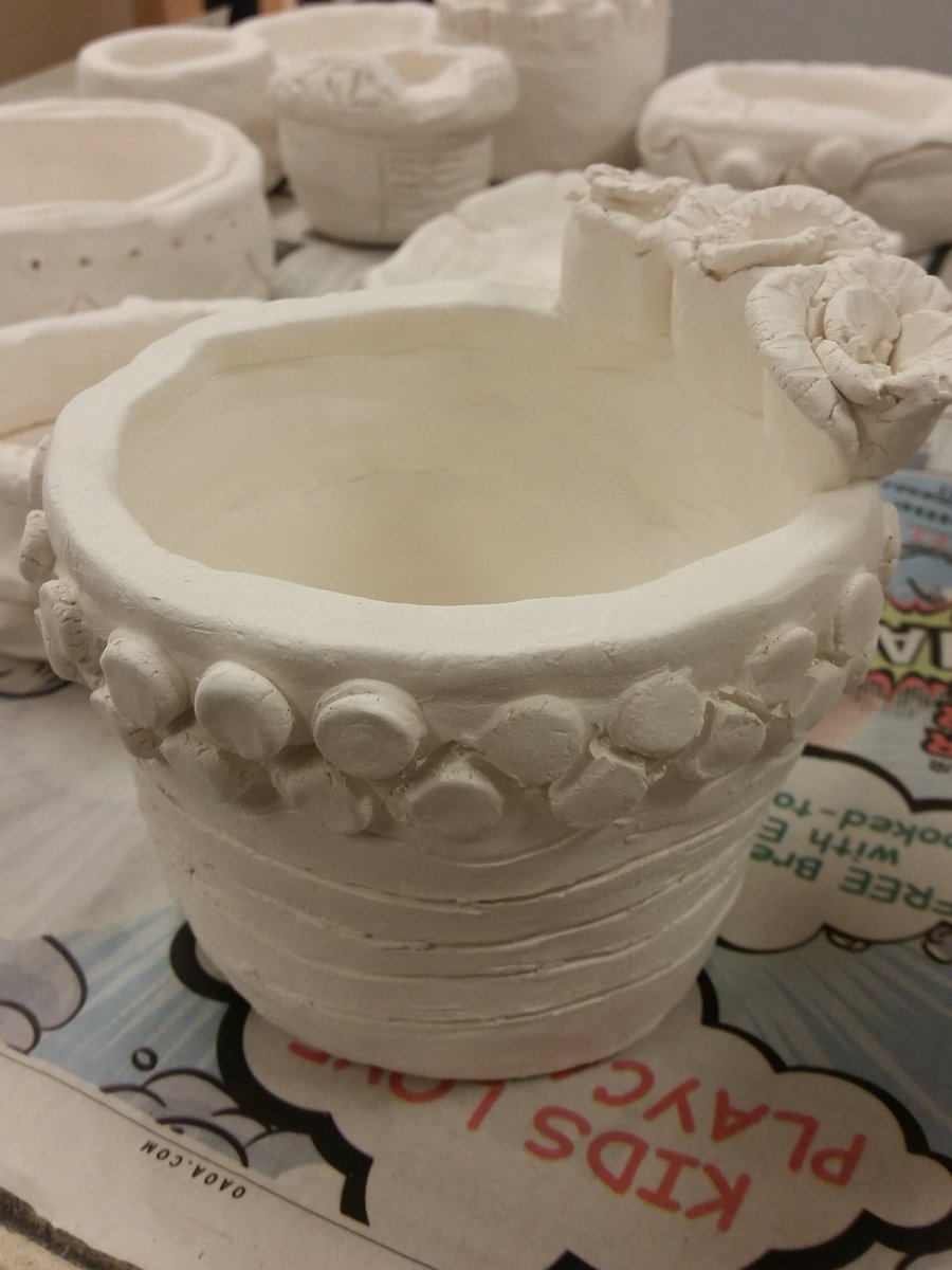 Le_arted's tweet photo. Yay! Our first clay fire! #noexplosions #middleschoolart #clay #handbuilding #bonfacnest https://t.co/fys9qP03HW